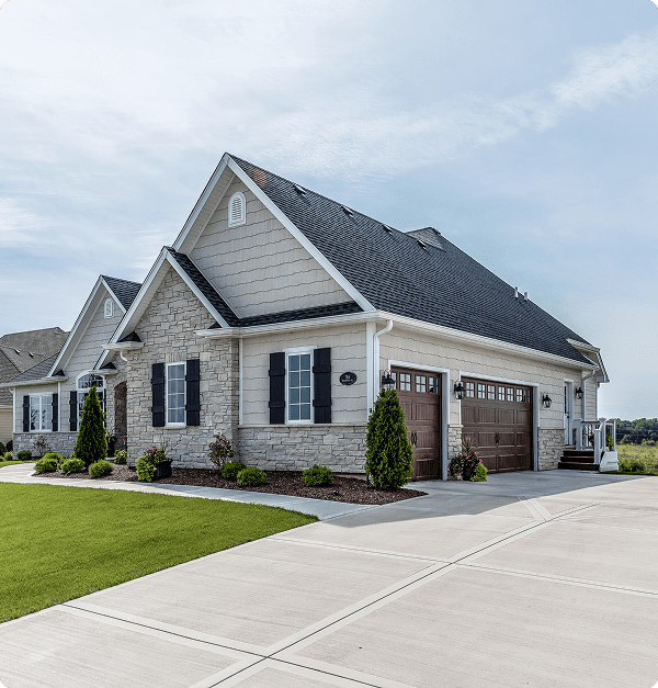 Modern suburban house with stone facade.