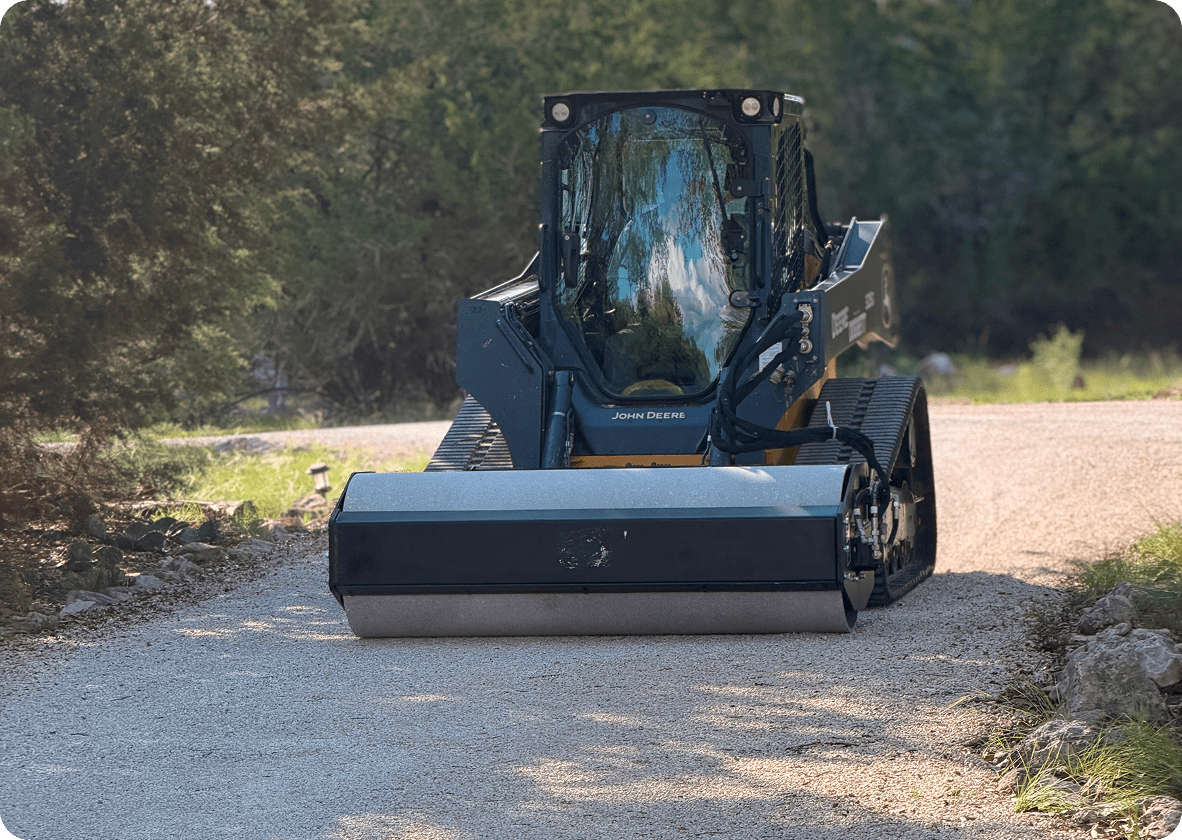 Black roller attachment on tracked machine